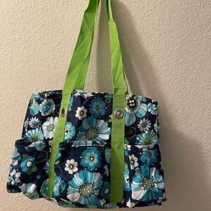 Thirty-one Floral pattern Navy, Teal & white,  7 pockets. Tote Lime straps.